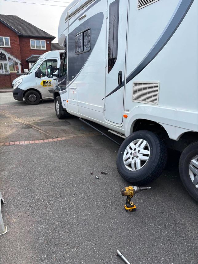 Twin rear wheels on a coachbuilt motorhome part way through a tyre change