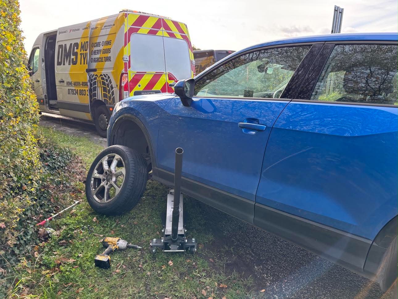 DMS Tyres mobile tyre fitter fitting a tyre in Middlewich