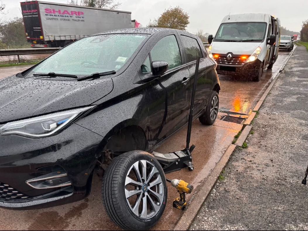 DMS Tyres van attending a roadside tyre change on the A50 near Uttoxeter