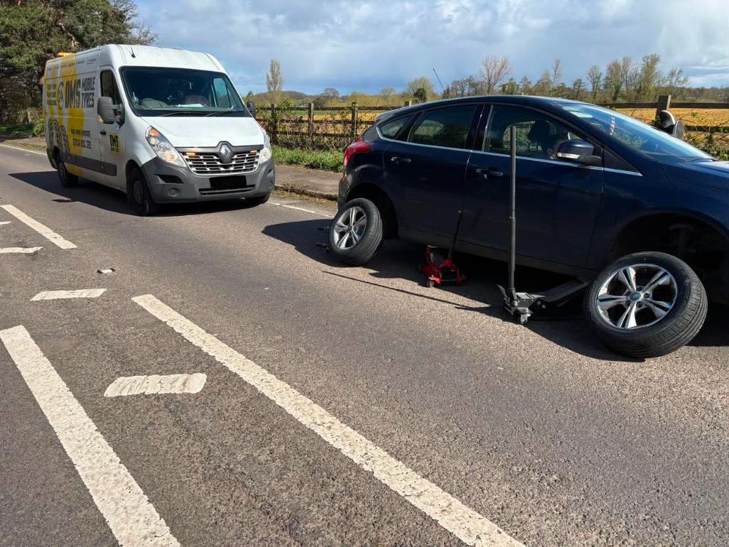 DMS Tyres mobile tyre fitter fitting a tyre in Nantwich