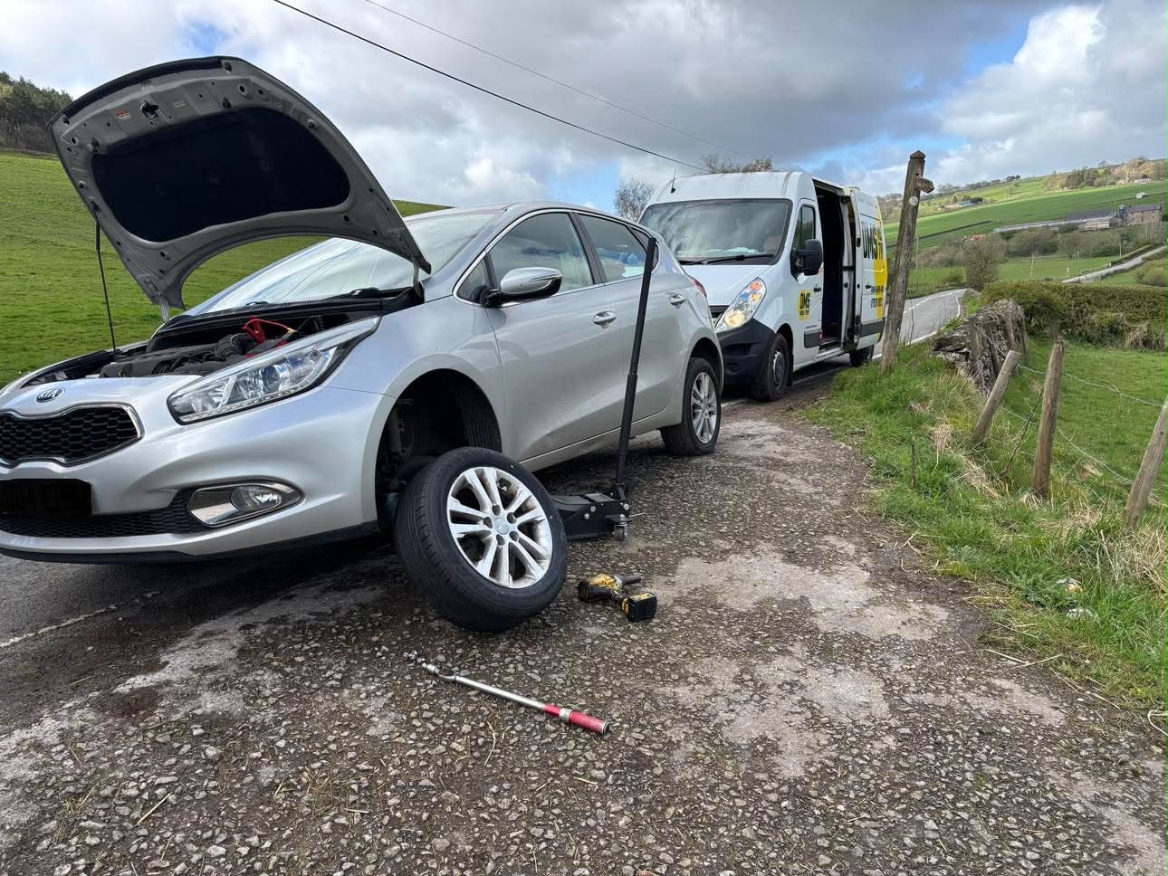 DMS Tyres mobile tyre fitter fitting a tyre in the Peak District