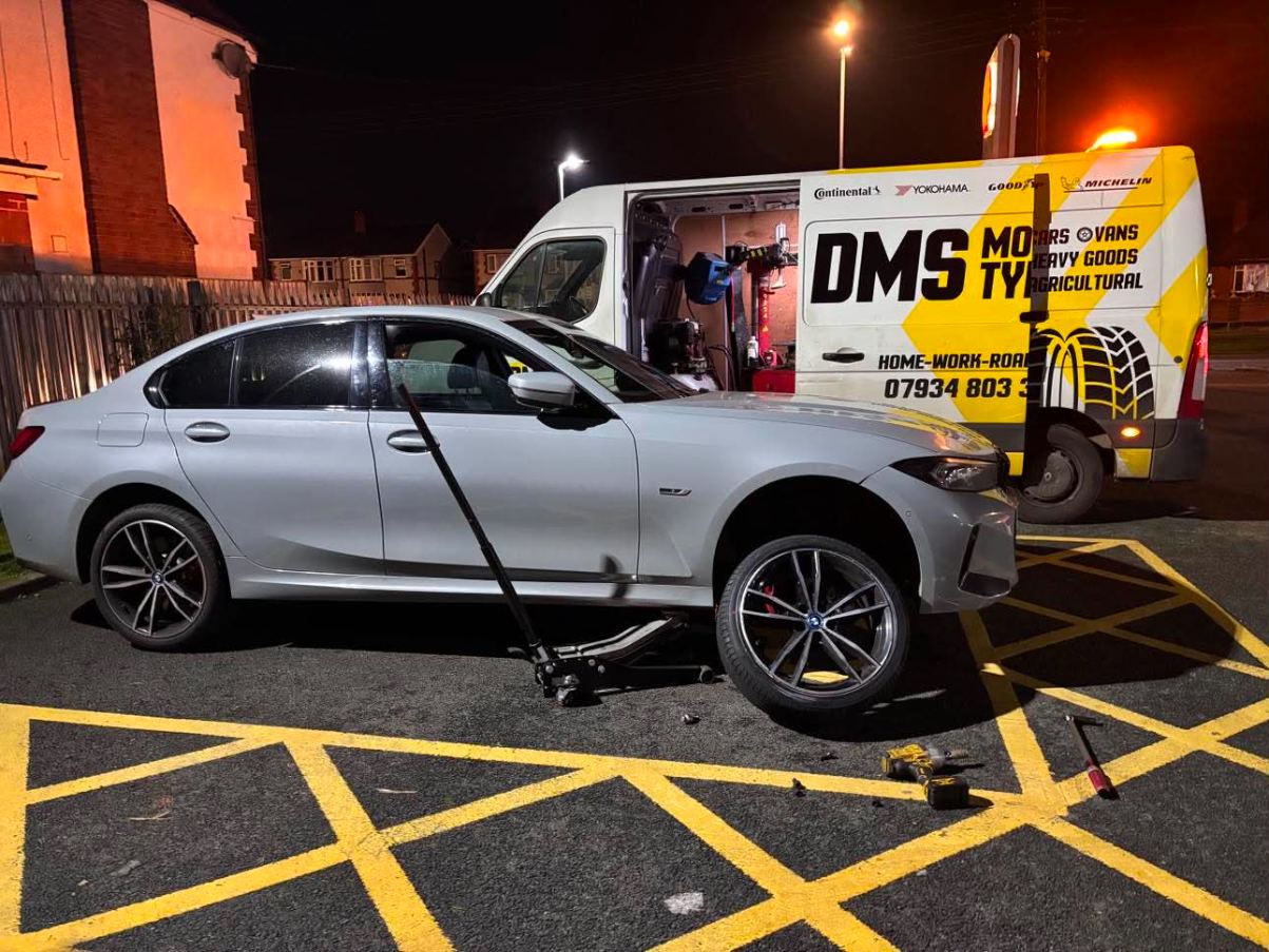 DMS Tyres mobile tyre fitter fitting a tyre in Stafford