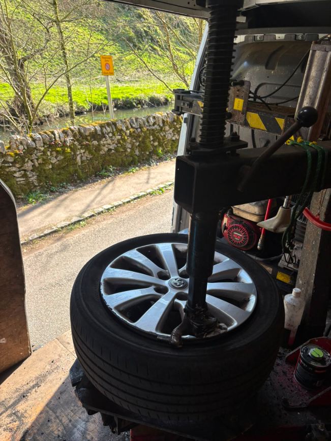 Tyre being fitted on the mobile tyre machine