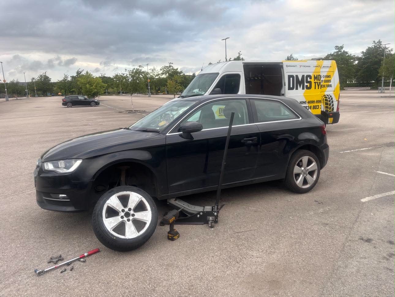 DMS Tyres mobile tyre fitter fitting a tyre in Uttoxeter